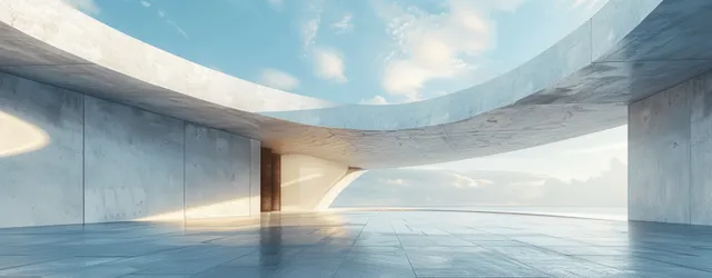 Curved concrete gallery interior with white walls and bright blue sky opening above