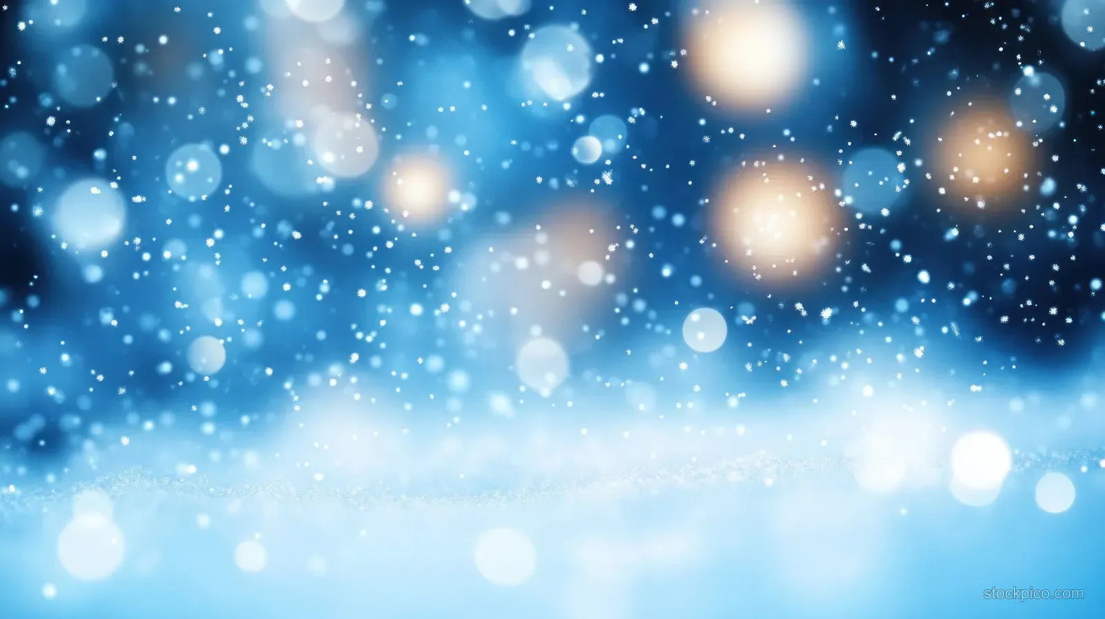 Snowflakes fall softly over a blue winter background with glowing blurred bokeh lights.