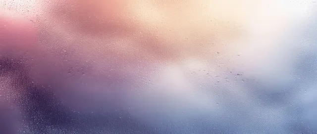 Pastel frosted glass like gradient haze with soft blurred light and fine grain texture across the background.