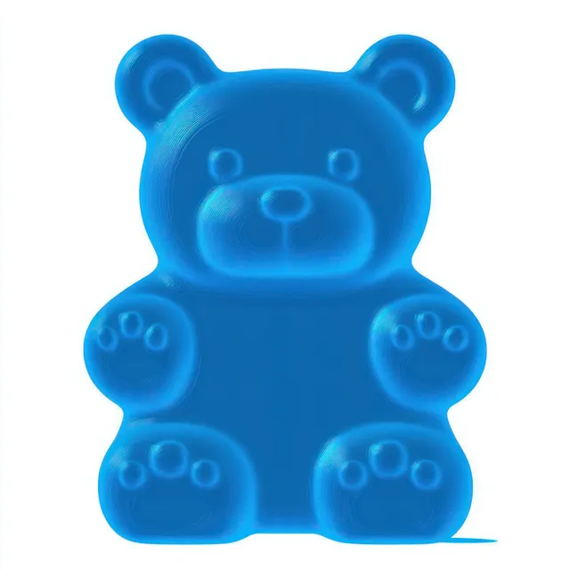 Shiny blue gummy bear candy with raised paws on white studio background