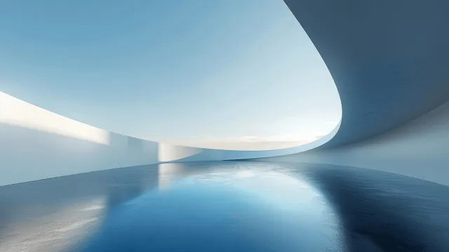 Minimal curved concrete wall stands over calm water, with reflections and soft shadows under a blue sky.
