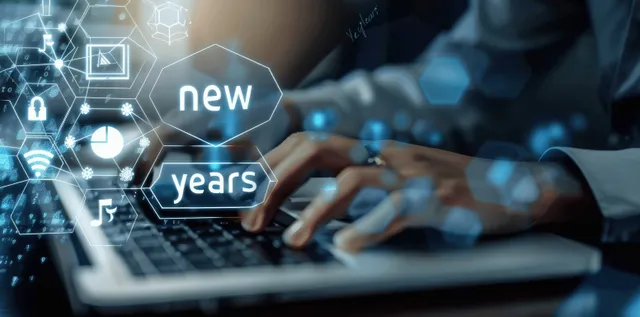 A person types on a laptop while a holographic overlay shows a “new years” timeline.
