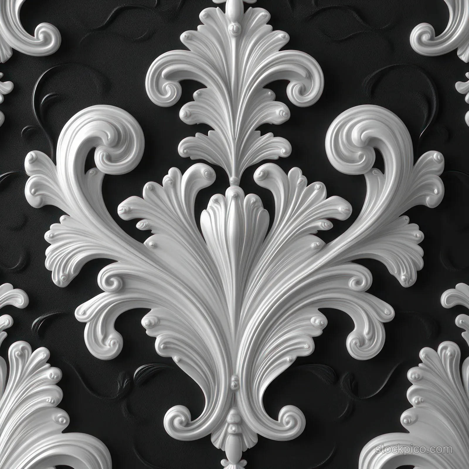 Centered Art Nouveau floral scroll ornament forming a seamless black and white swirl pattern on dark background.