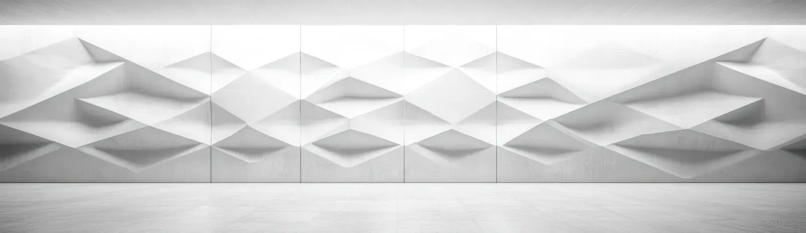 Grayscale symmetrical 3D geometric ridges form repeating facets across the top with an empty strip in the center.