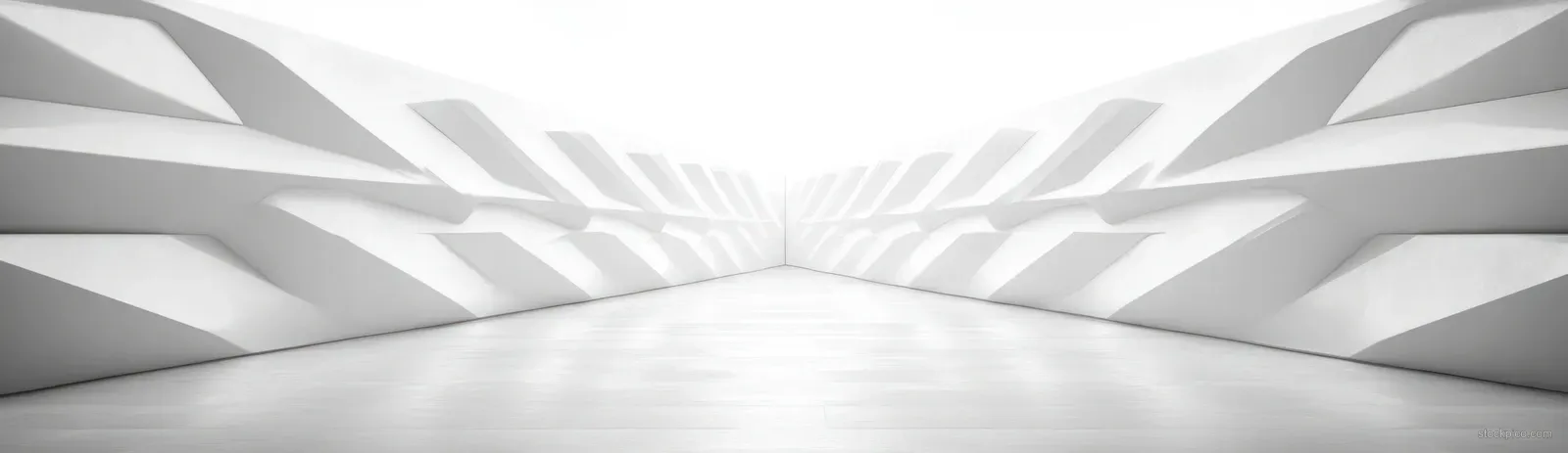 White and gray angular geometric panels form a symmetrical tunnel with soft light and deep perspective.