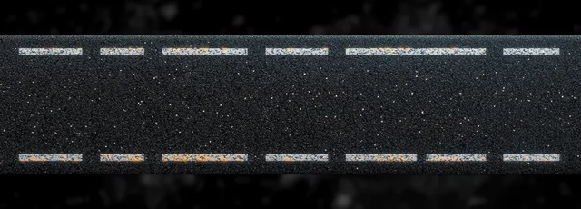 Aerial close-up of asphalt lane with white dashed lines and scuffed orange paint texture
