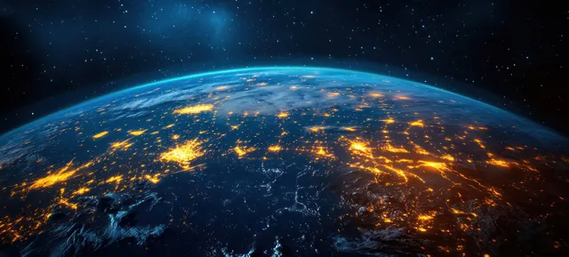 Earth seen from orbit at night, glowing city lights over Russia and Kazakhstan region