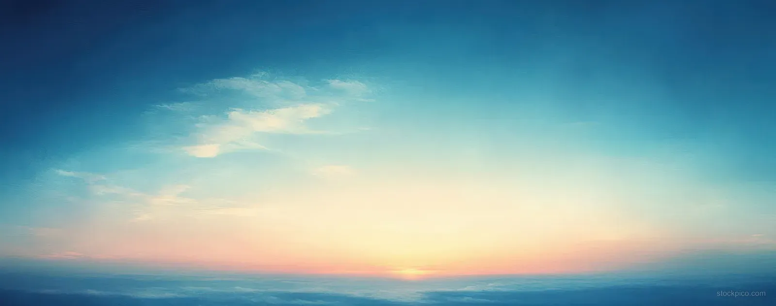 Pastel dusk sky with soft glowing clouds fading into the horizon.