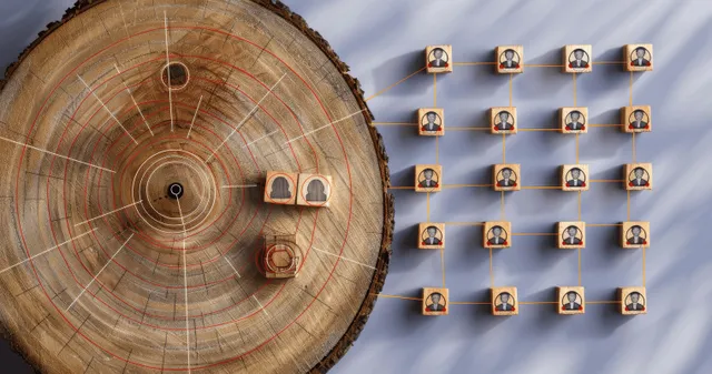 Wooden circular planning board with connected human icon blocks arranged around it.