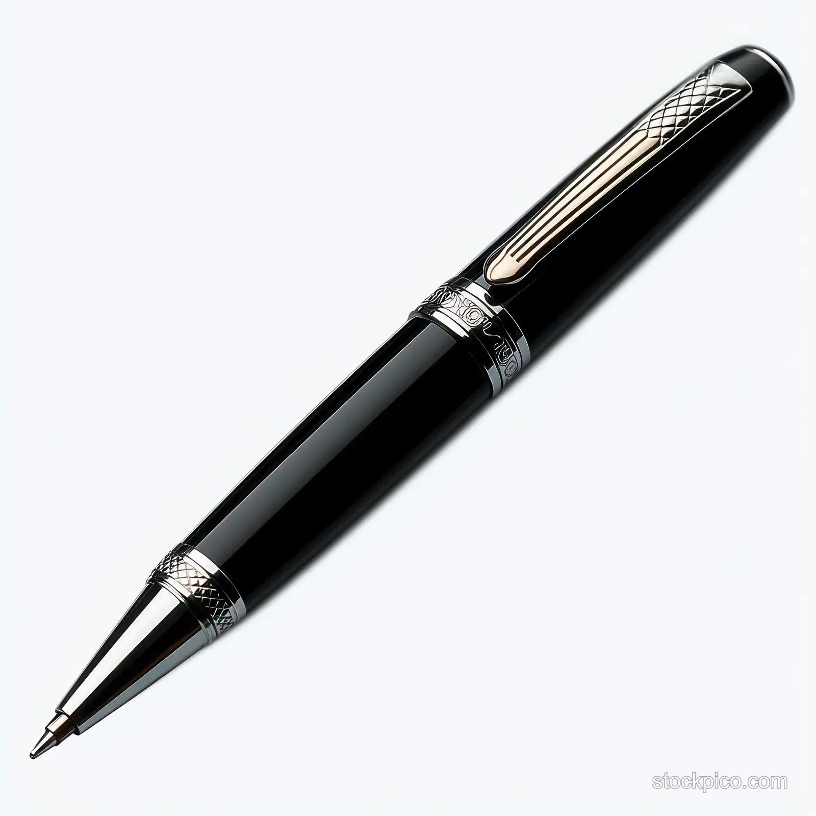 Black ballpoint pen with silver decorative rings lying diagonally on a white background.