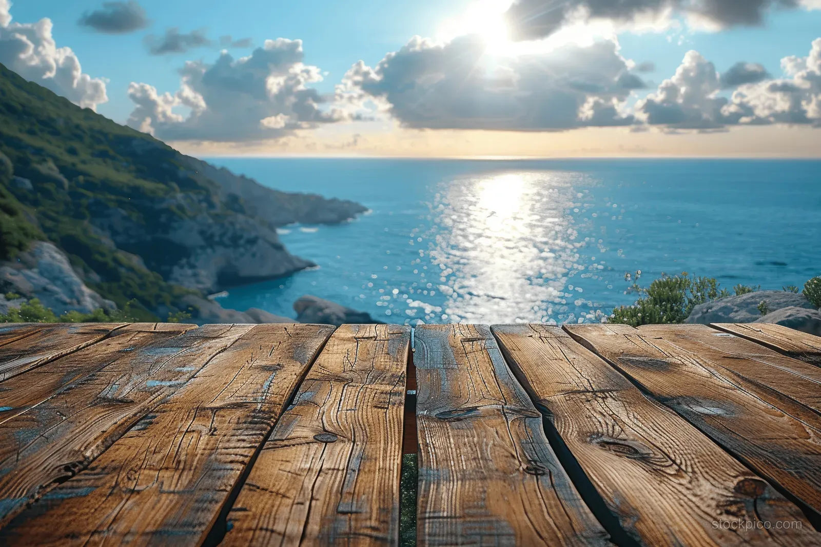 Wooden tabletop with a sunny sea, island, and palm-covered coastline in the background.