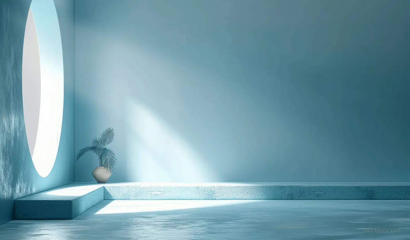 Light blue minimalist interior with a bright vertical light beam, soft shadows, and an empty wall for product display.