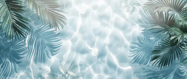 Palm leaves frame rippling water patterns on a calm light blue and white background