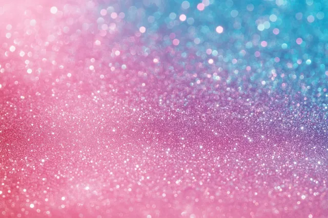 Close-up glitter background showing pink-to-blue gradient sparkle dust with soft bokeh lights.