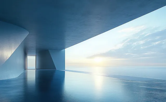 Minimalist concrete room overlooking an open pool that reflects the sunrise sky above the ocean horizon.