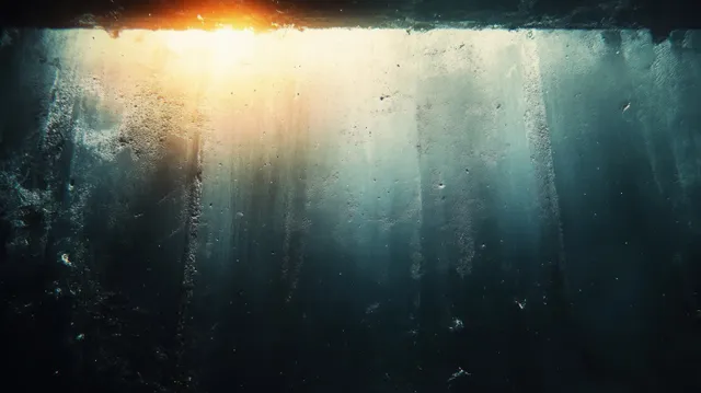 Dark grunge background with scratches and stains and a soft amber light glow near the top.
