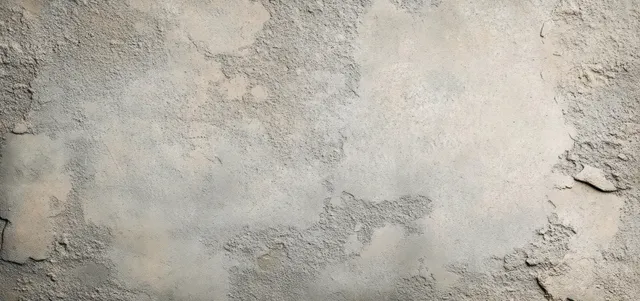 Weathered concrete wall texture with abstract grunge marks and muted stone-like tones