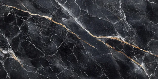 Black marble slab with white and gold veins flowing across textured abstract surface