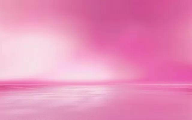 Pink seascape at dusk with smooth water mirror and soft gradient sky horizon