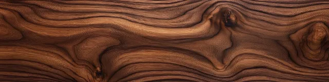 Close-up walnut wood texture with swirling grain patterns under warm natural light