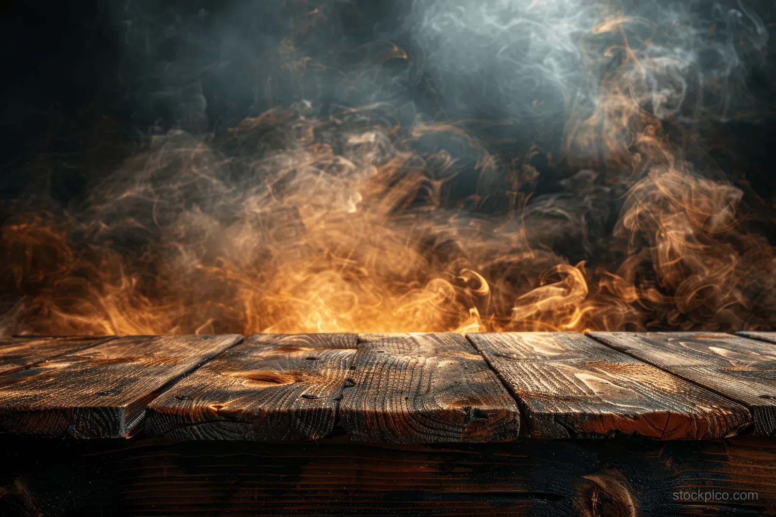 An empty wooden table top with smoky steam swirling across a dark background.