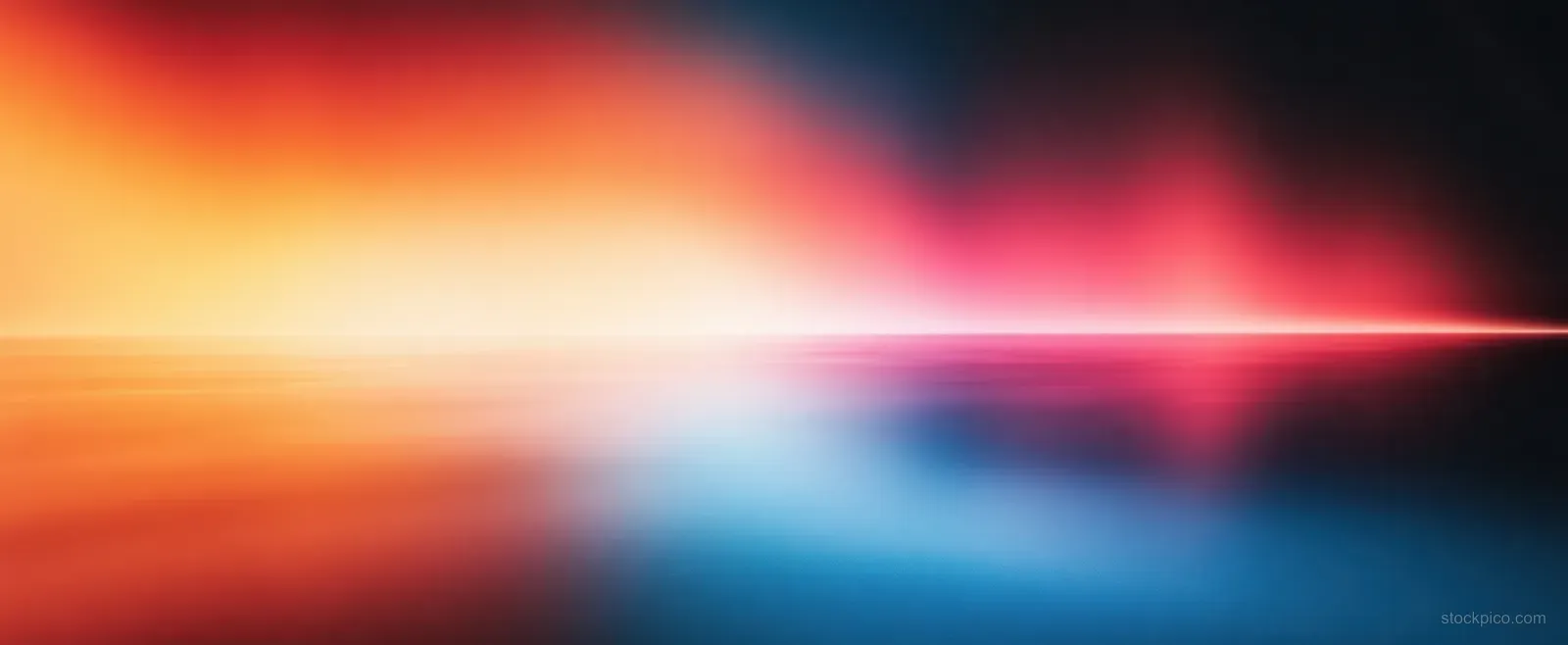 Abstract flowing gradient waves in blue, yellow, red, and pink across a dark background.