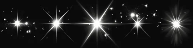 Multiple white light bursts and lens flare star sparkles shine across a black background.