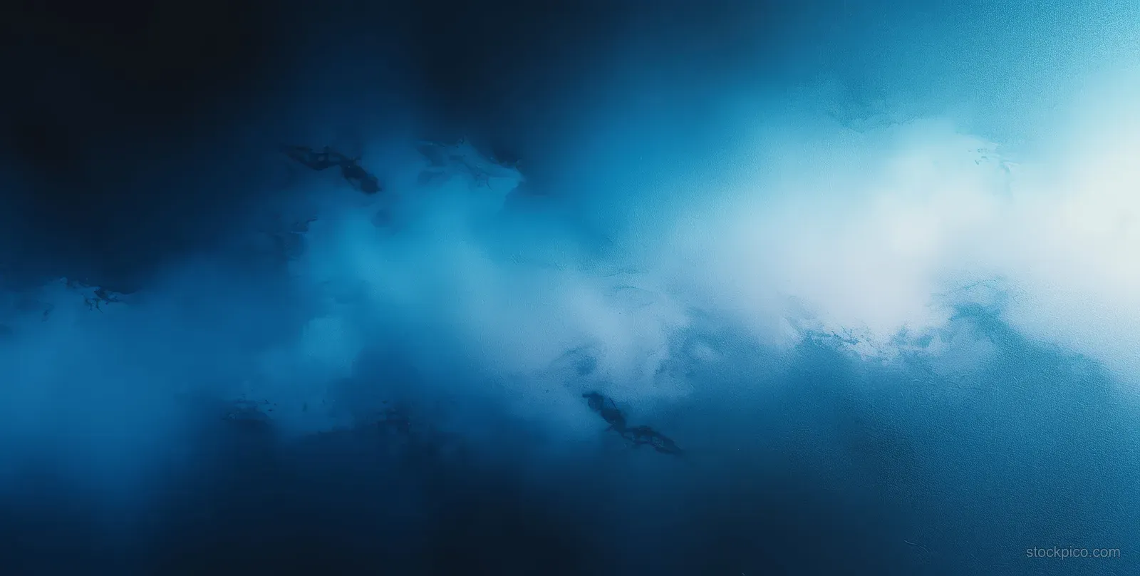 Abstract blue-black gradient background with grainy texture and a soft glowing light spot.