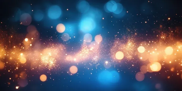 Blue and gold fireworks illuminate a soft-focus bokeh night background with shimmering light trails.