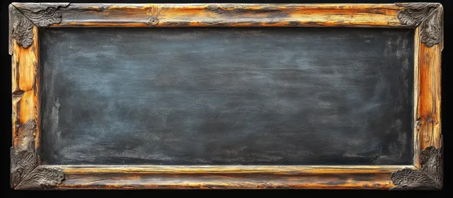 Worn rectangular blackboard with carved wooden frame corners against a dark background