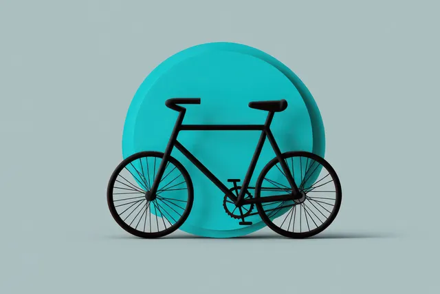 Minimal black bicycle leaning against turquoise circle on light gray backdrop