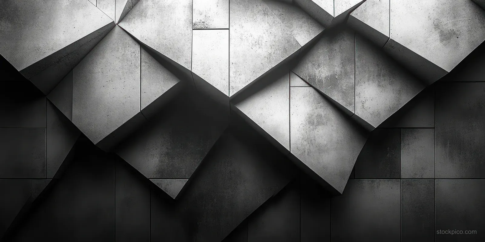 Grayscale triangular panels interlock in a geometric pattern with soft shadows and visible depth.