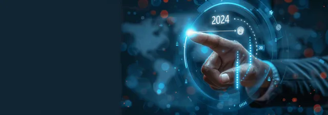 A businessman points at a glowing holographic 2024 digital finance dashboard with charts and target markers.