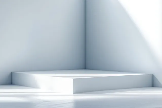 Minimalist interior corner with smooth white walls and a stepped platform under soft daylight.