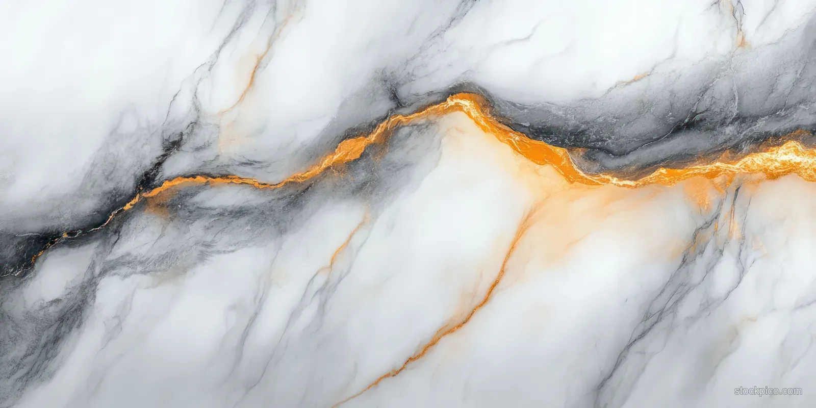 White marble close-up with gray striations and orange-gold veins flowing across a smooth polished surface.