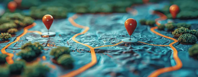 Close-up of a digital city map with glowing GPS pins and highlighted roads on a smartphone screen.