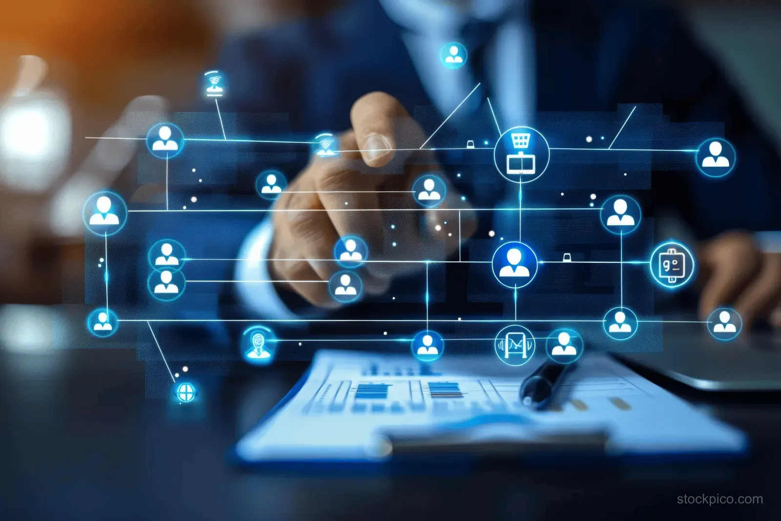 Businessman at a desk editing a glowing digital organization chart with HR workflow connection nodes.