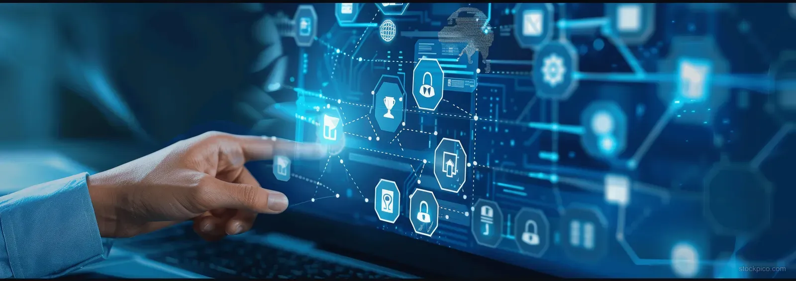 A person’s hand types on a laptop as glowing AI and security network icons float over a blue screen.