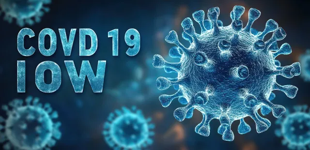 A dark digital banner reads COVID-19 NOW beside glowing blue virus particles.