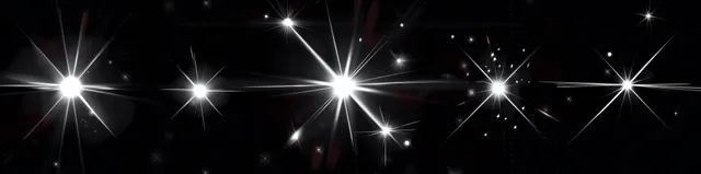 Glowing starburst lens flares with light rays over dark background