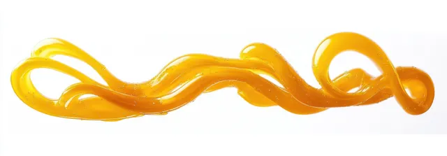 Golden liquid ribbon swirl with air bubbles on clean white background