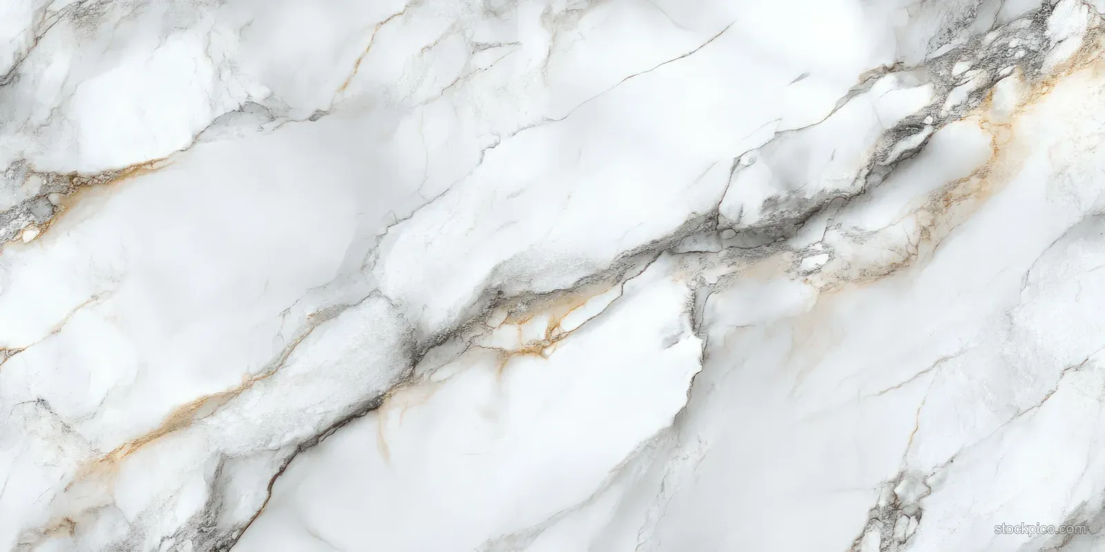 White marble surface with fine grey and gold veins.