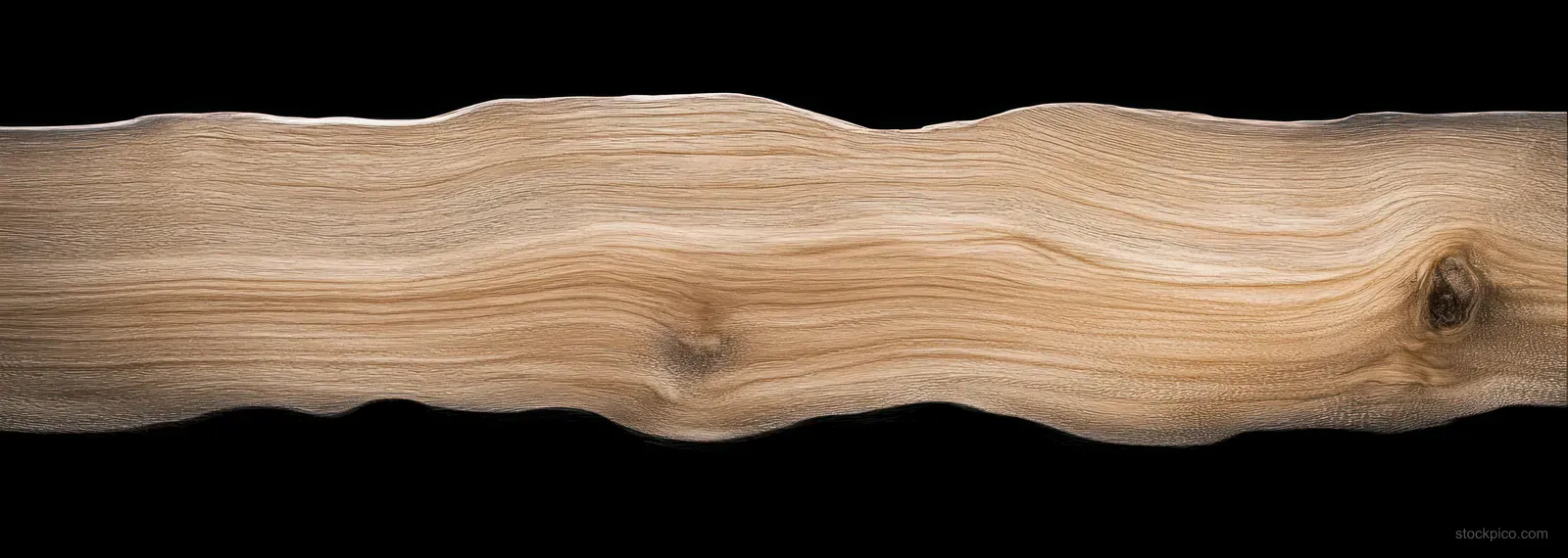 Wavy wooden plank with visible knots and natural grain on a black background.
