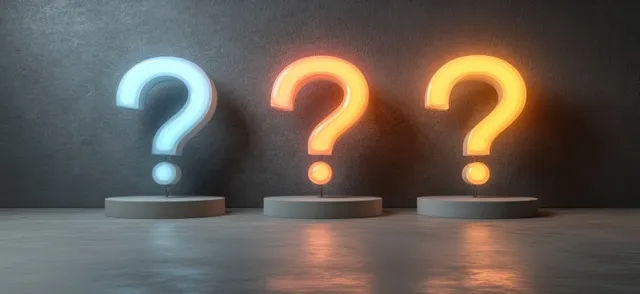 Three glowing suspended question marks hover above three pedestals in a dark minimalist studio with a reflective floor.