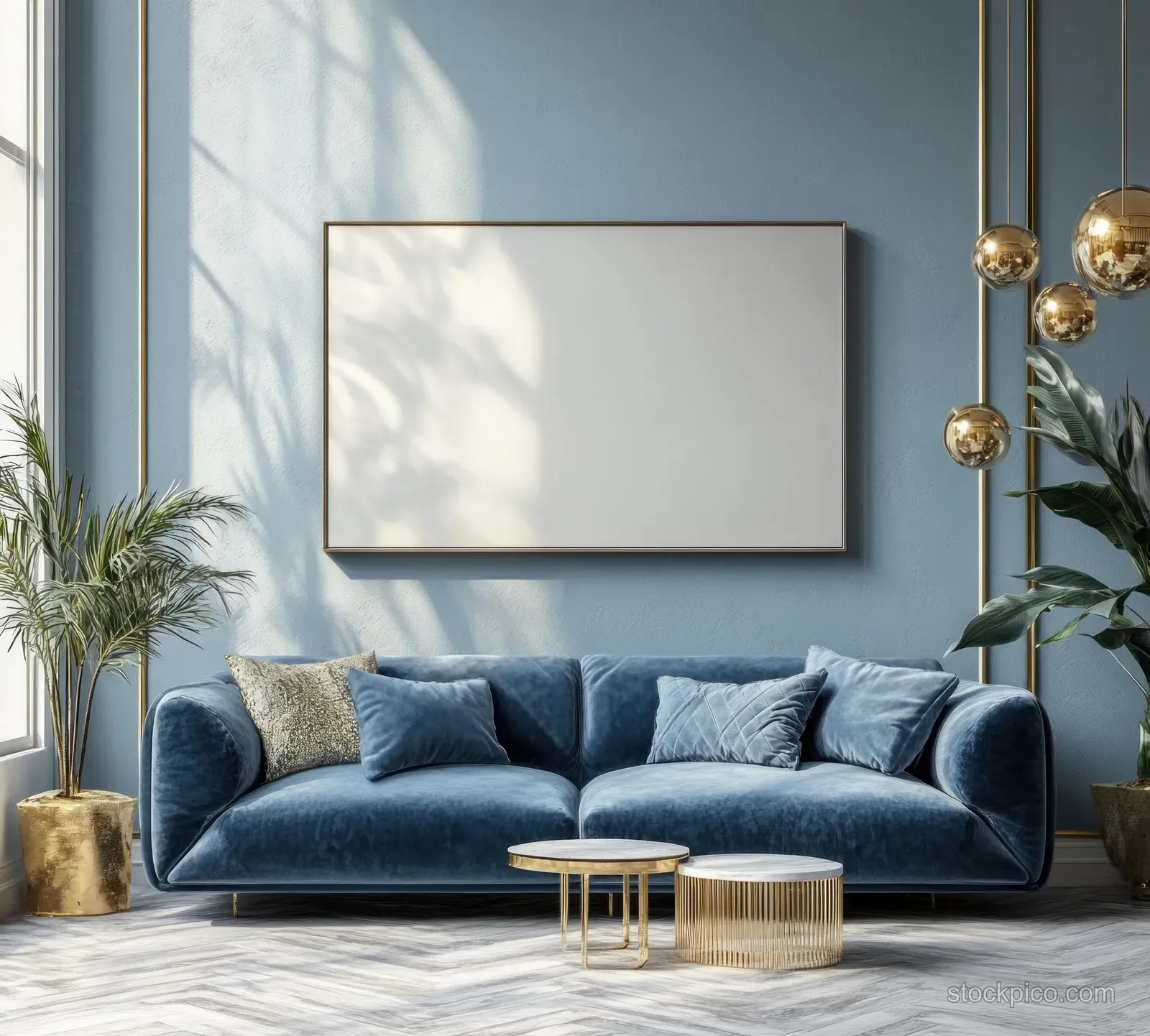 Blue velvet sofa sits in a sunlit Scandinavian living room with golden decor and a blank wall art canvas.