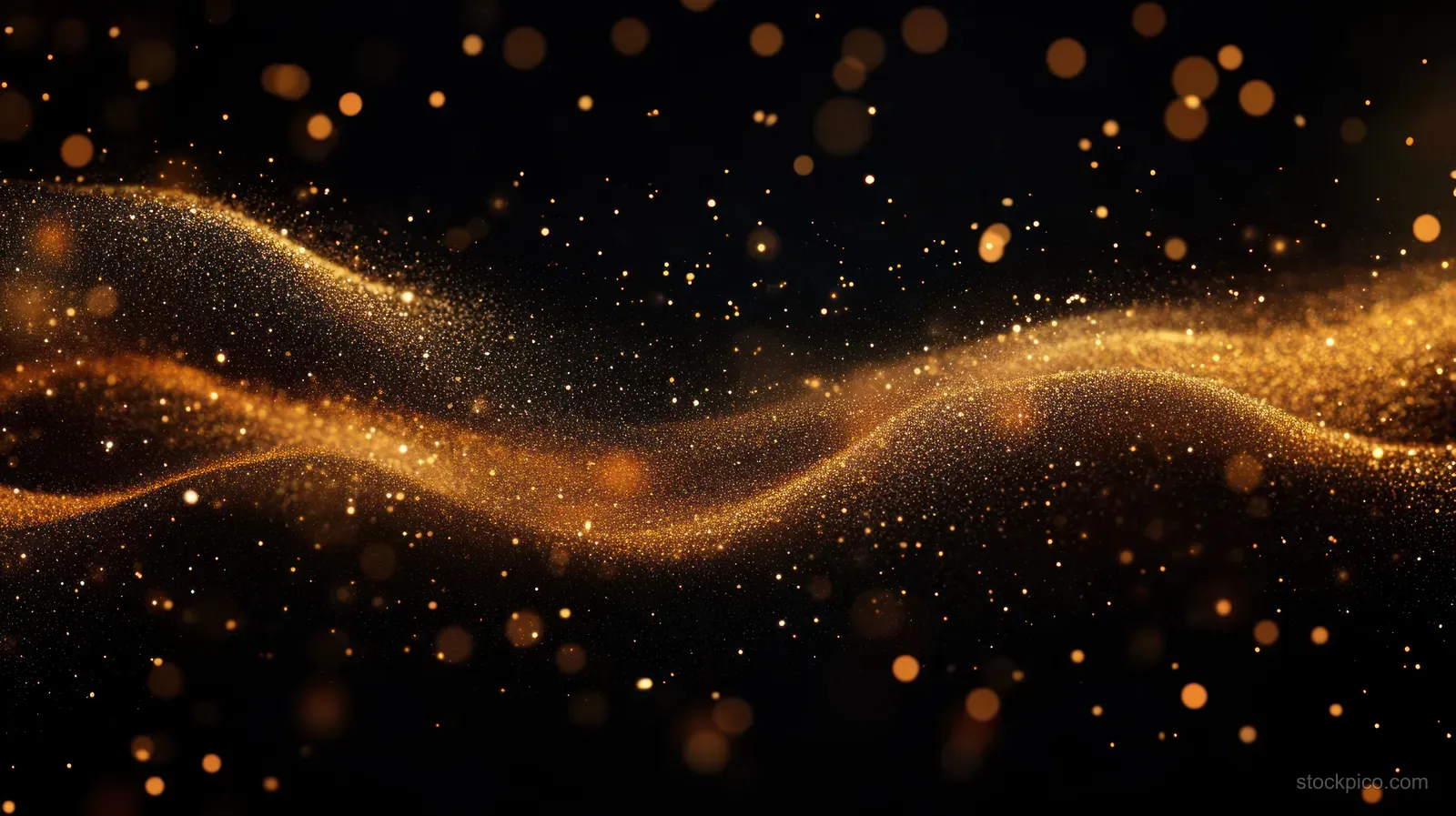 Golden particles forming a glowing wave on a dark background.