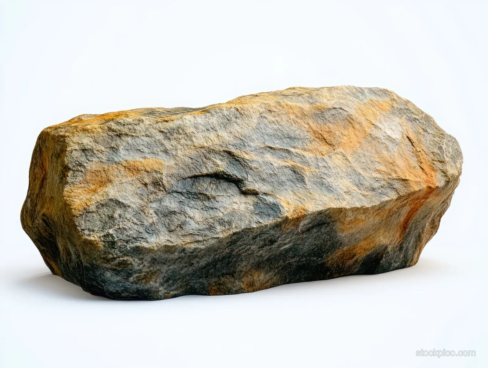 Large irregular boulder with rough gray and orange texture isolated on a white background.