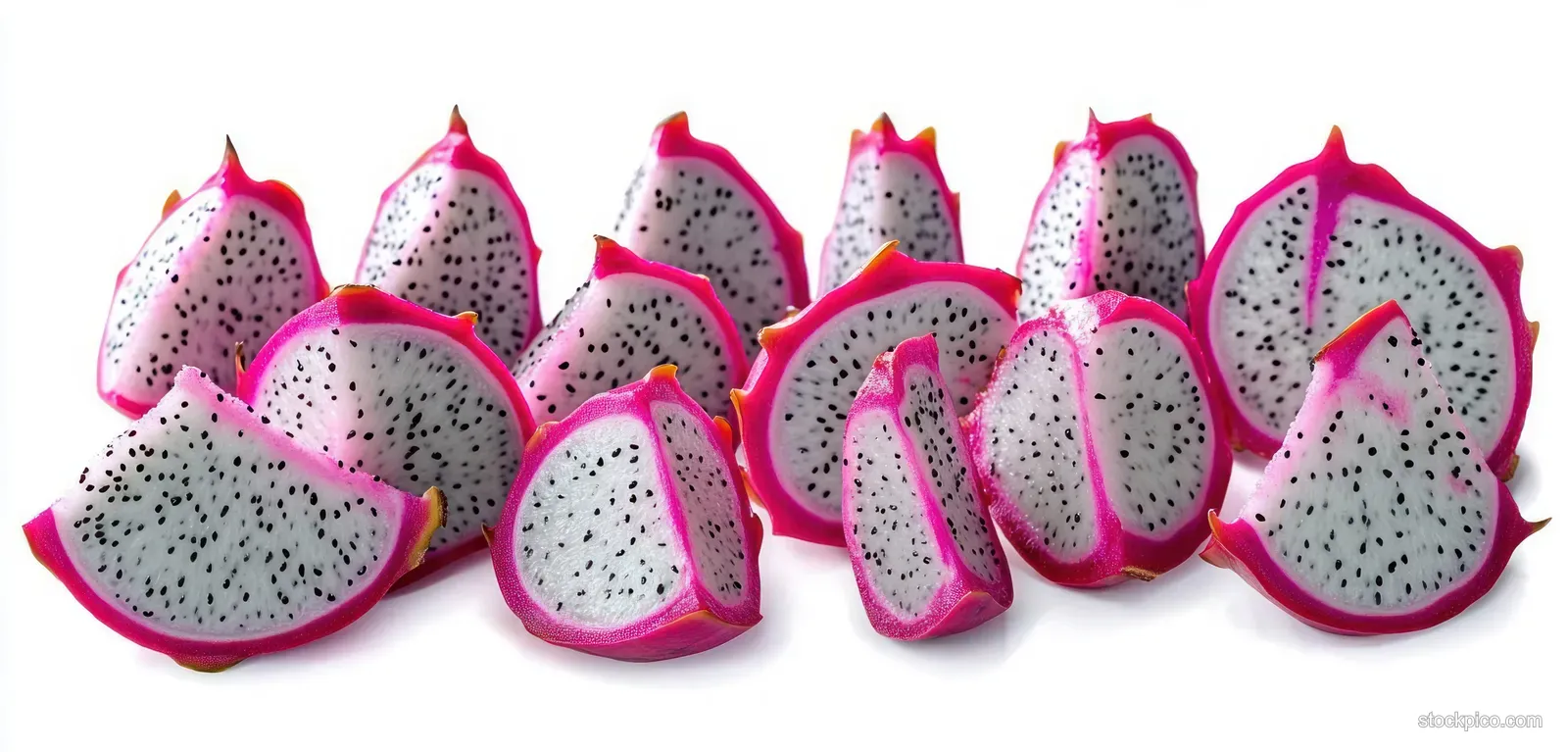 Bright pink dragon fruit slices with white flesh and black seeds arranged on a white background.