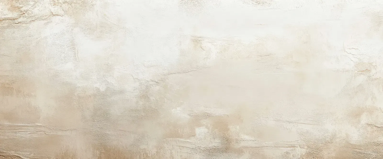 Abstract cream and beige textured background with soft brush-like variations.
