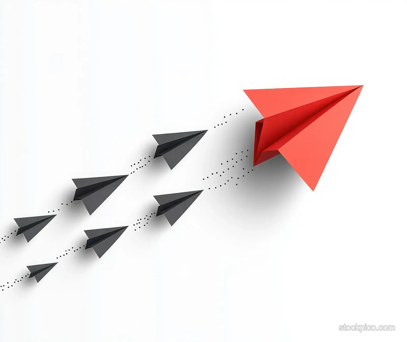 A red paper airplane leads smaller black paper planes forward with dotted trails on a white background.